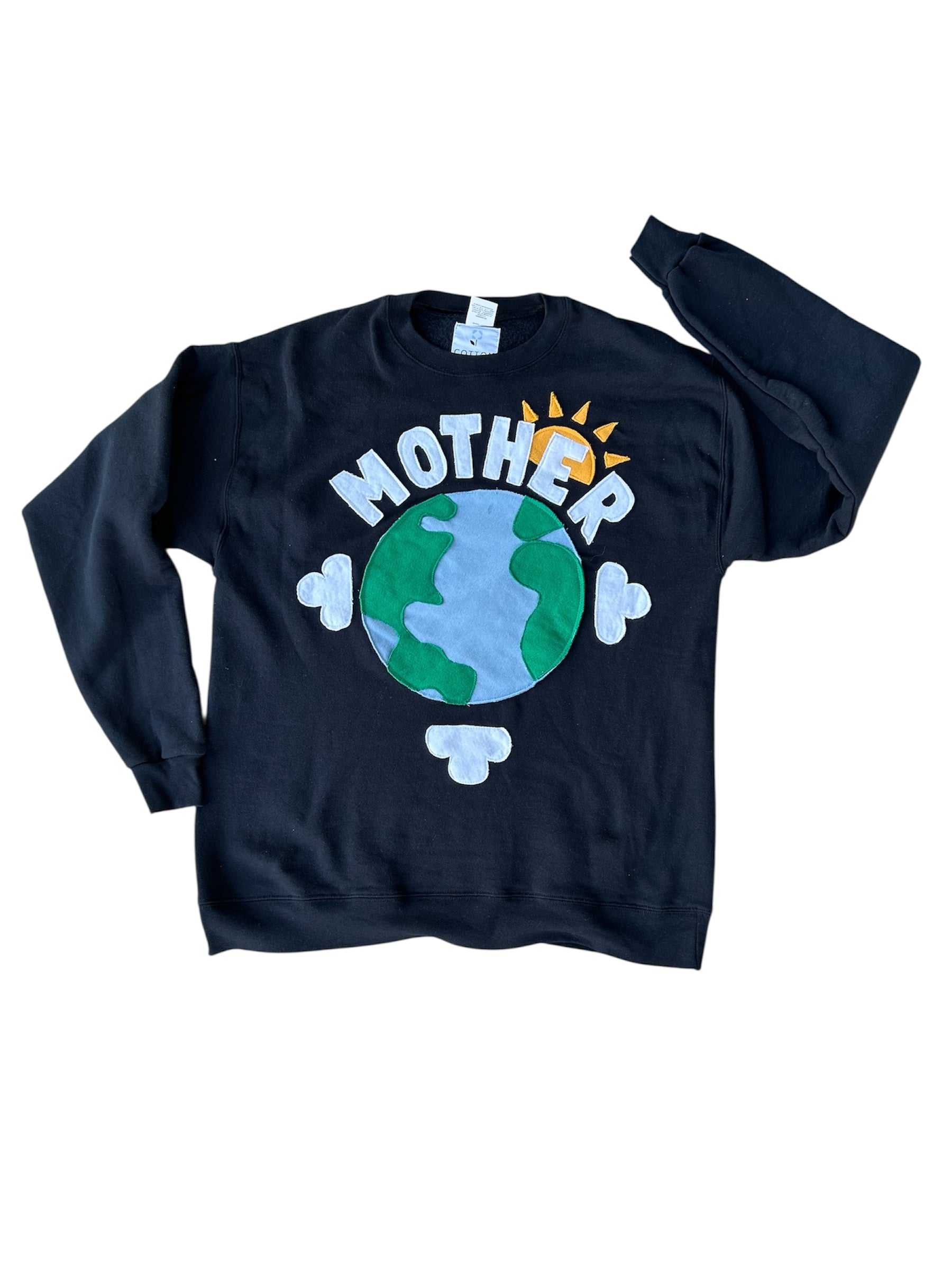 Black sweatshirt with 'MOTHER Earth design on a white background